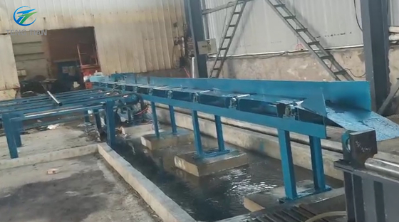 Acumulador em espiral para máquina de fabricação de tubos de aço